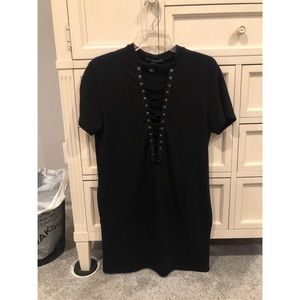 bodycon dress with lace up front and pockets